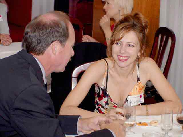 A foreign man mingling with one of the charming Russian ladies during the socials